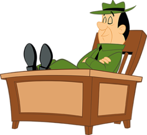 Ranger Smith relaxing with his feet on a desk at Jellystone Park South Haven campground office